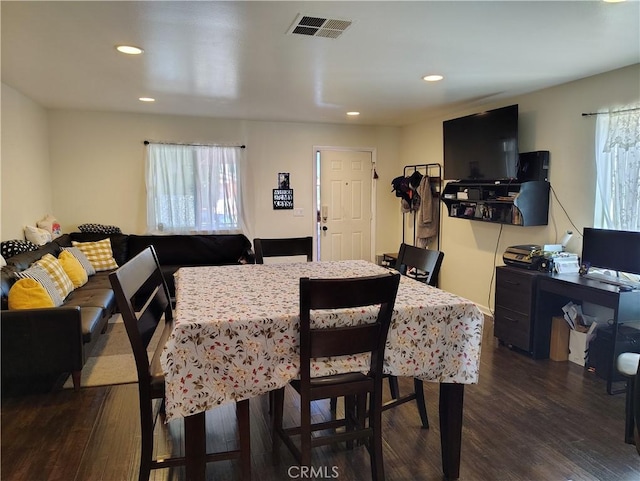 10815 Gorman Ave, Los Angeles, CA 90059 - dining space featuring dark wood finished floors and recessed lighting