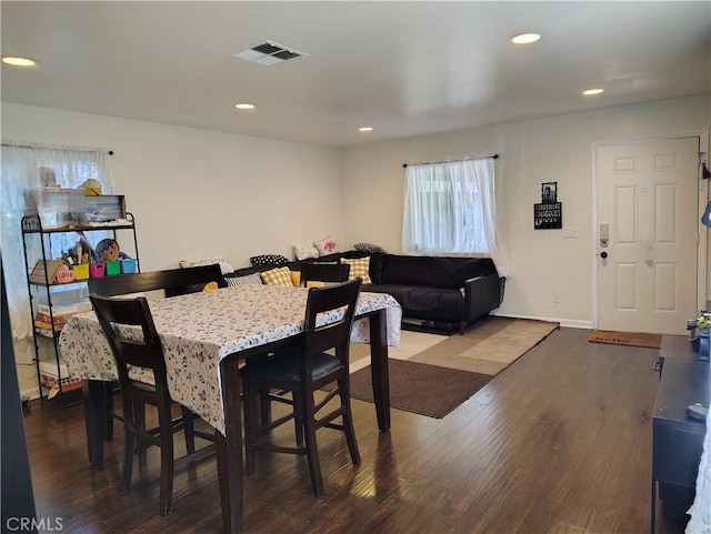 10815 Gorman Ave, Los Angeles, CA 90059 - dining area with dark wood-style flooring and recessed lighting