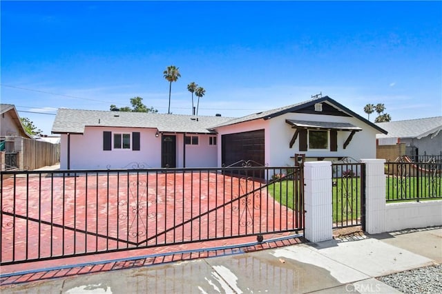 1132 Broadmoor Ave, La Puente, CA 91744 - ranch-style home featuring stucco siding, a fenced front yard, a garage, and a shingled roof