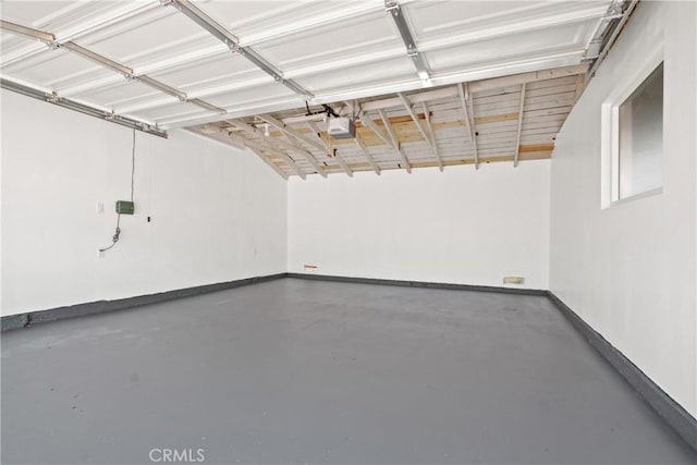 1132 Broadmoor Ave, La Puente, CA 91744 - garage with a garage door opener and baseboards