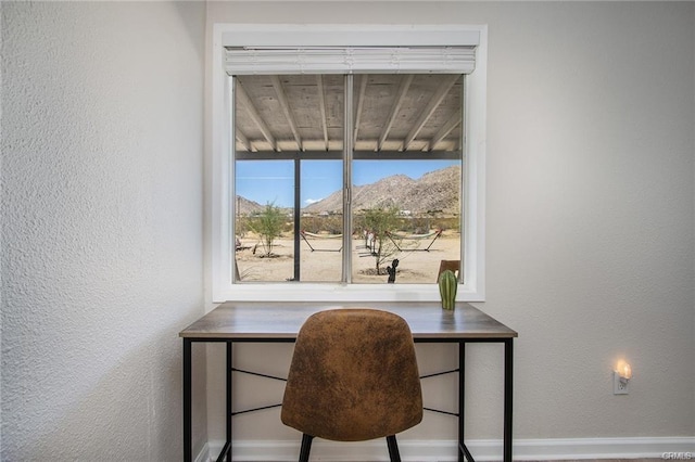 4574 Avenida Del Sol, Joshua Tree, CA 92252 - office space featuring a textured wall and a mountain view