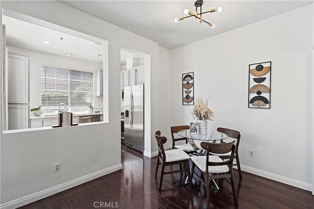 125 Draft Way, Placentia, CA 92870 - dining room with a chandelier and dark wood-style flooring