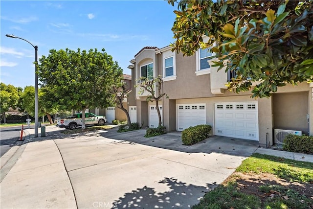 125 Draft Way, Placentia, CA 92870 - multi unit property with stucco siding, driveway, and an attached garage