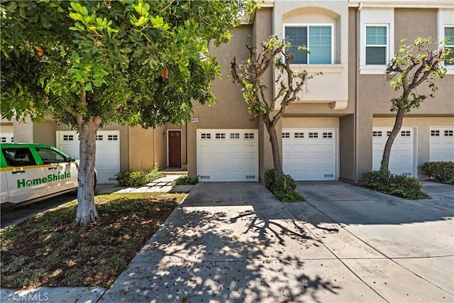 125 Draft Way, Placentia, CA 92870 - multi unit property featuring stucco siding, driveway, and a garage