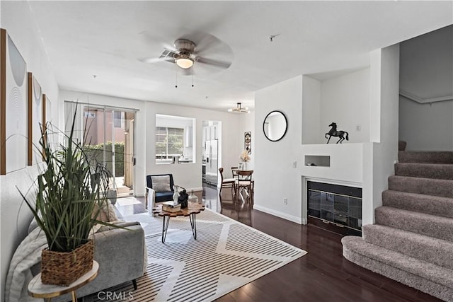 125 Draft Way, Placentia, CA 92870 - living area with ceiling fan, stairway, wood finished floors, and a glass covered fireplace