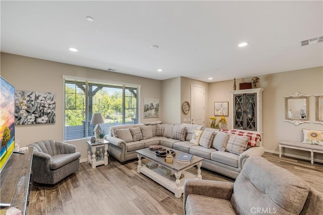 300 Farmhouse Dr Unit 3, Simi Valley, CA 93065 - living area featuring wood finished floors and recessed lighting
