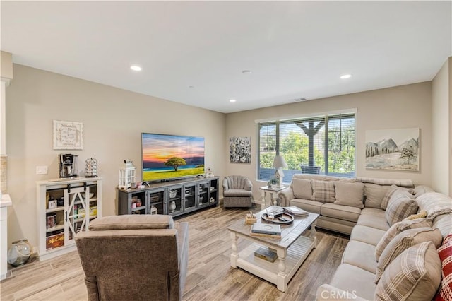 300 Farmhouse Dr Unit 3, Simi Valley, CA 93065 - living room with light wood finished floors and recessed lighting