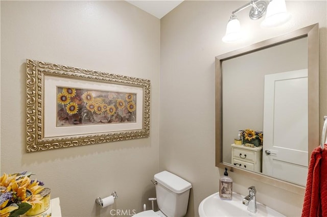 300 Farmhouse Dr Unit 3, Simi Valley, CA 93065 - half bathroom featuring a sink and toilet