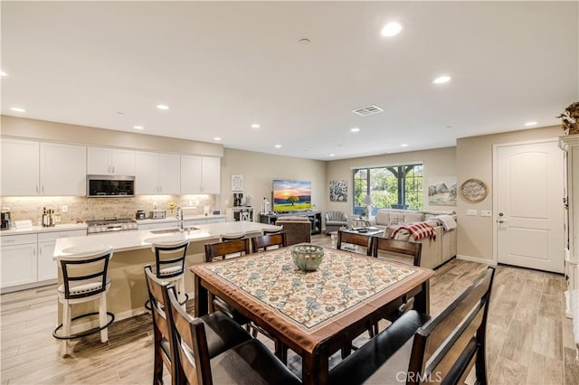 300 Farmhouse Dr Unit 3, Simi Valley, CA 93065 - dining space with light wood-type flooring and recessed lighting