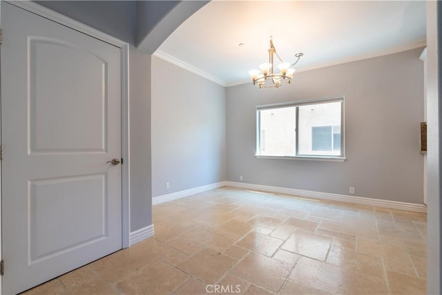 11253 Peach Grove St Unit 106, North Hollywood, CA 91601 - spare room featuring stone tile flooring, crown molding, a chandelier, and arched walkways