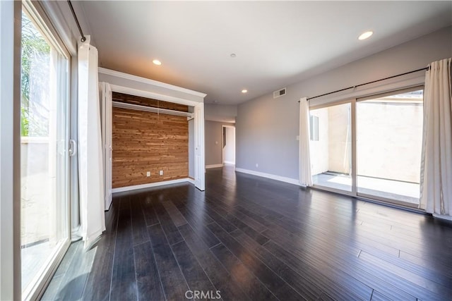 11253 Peach Grove St Unit 106, North Hollywood, CA 91601 - unfurnished living room with dark wood finished floors and recessed lighting