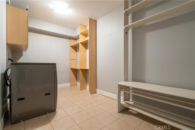 11253 Peach Grove St Unit 106, North Hollywood, CA 91601 - walk in closet with light tile patterned floors