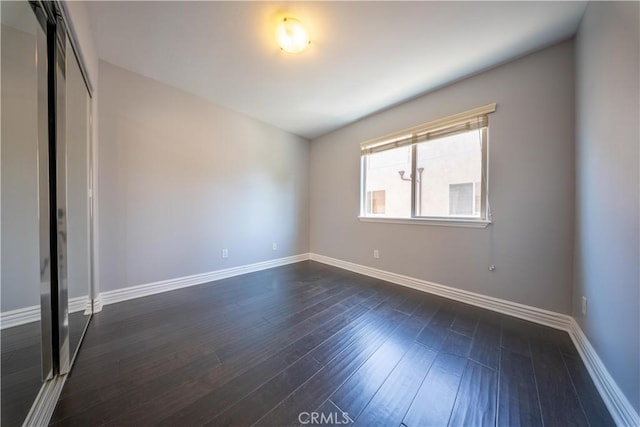 11253 Peach Grove St Unit 106, North Hollywood, CA 91601 - unfurnished room with dark wood-style flooring