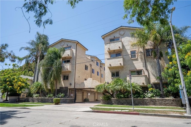 11253 Peach Grove St Unit 106, North Hollywood, CA 91601 - view of property with driveway