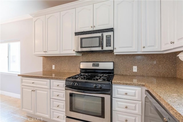 11253 Peach Grove St Unit 106, North Hollywood, CA 91601 - kitchen with stainless steel appliances, white cabinets, and crown molding