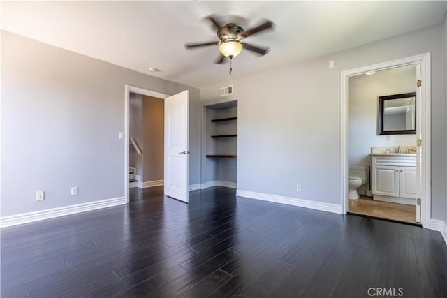 11253 Peach Grove St Unit 106, North Hollywood, CA 91601 - unfurnished bedroom with dark wood-style flooring and ensuite bath