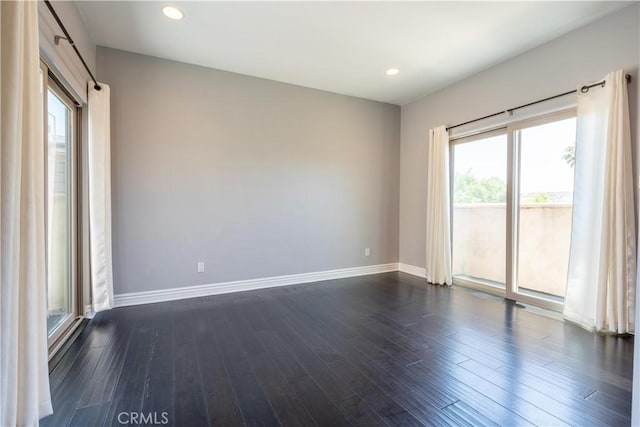 11253 Peach Grove St Unit 106, North Hollywood, CA 91601 - spare room featuring dark wood-style floors and recessed lighting