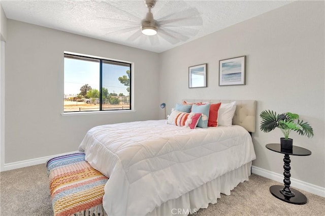 11969 Pinon Ave, Hesperia, CA 92345 - carpeted bedroom featuring a textured ceiling and a ceiling fan