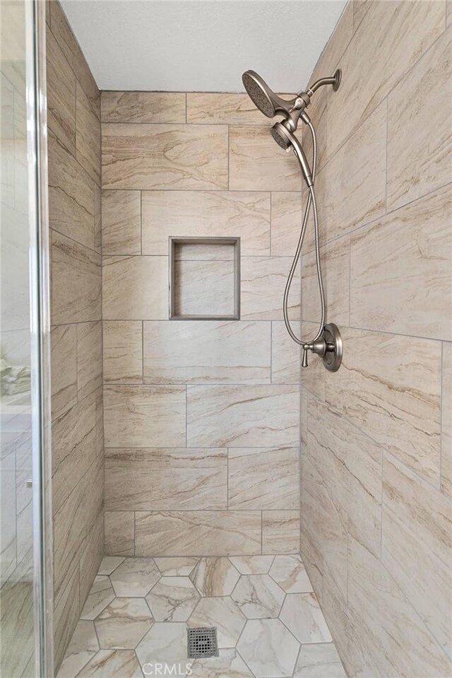11969 Pinon Ave, Hesperia, CA 92345 - bathroom featuring a shower stall