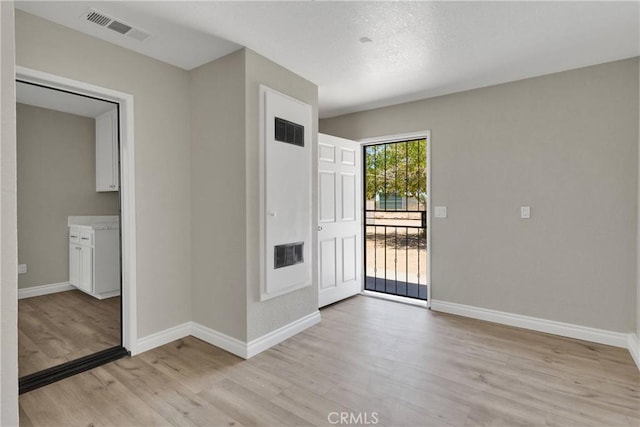 11969 Pinon Ave, Hesperia, CA 92345 - entryway featuring light wood finished floors and baseboards
