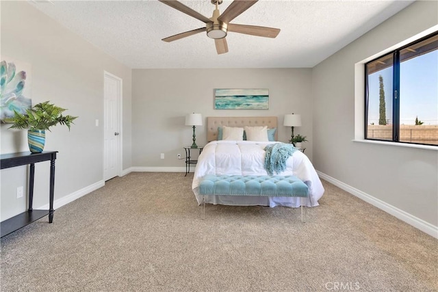 11969 Pinon Ave, Hesperia, CA 92345 - carpeted bedroom featuring a textured ceiling and ceiling fan