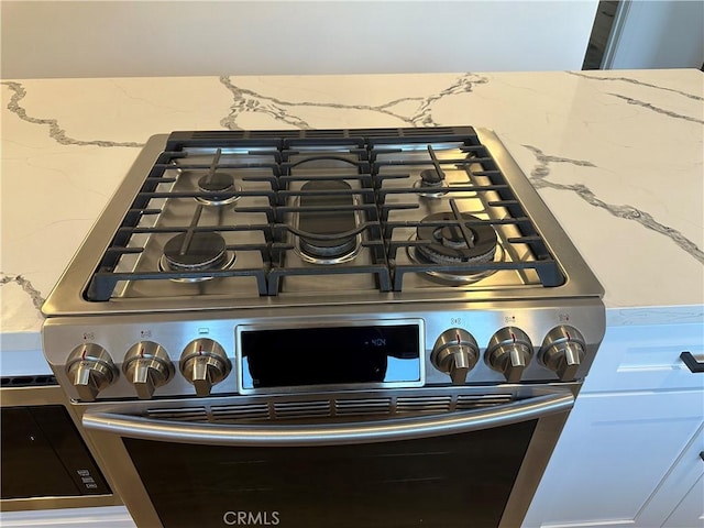 632 Truly Unit 634, Vista, CA 92084 - kitchen view of gas range and stone counters