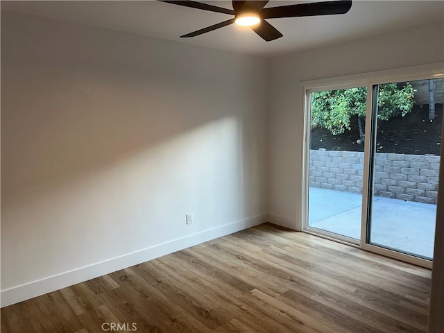 632 Truly Unit 634, Vista, CA 92084 - empty room with wood finished floors and a ceiling fan