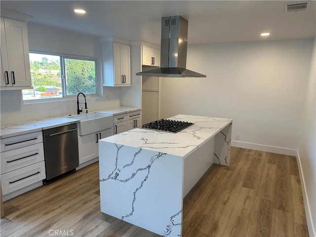 632 Truly Unit 634, Vista, CA 92084 - kitchen featuring island range hood, dishwasher, light wood-style floors, light stone countertops, and recessed lighting