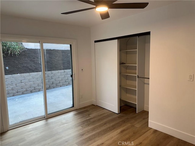 632 Truly Unit 634, Vista, CA 92084 - unfurnished bedroom featuring access to exterior, a closet, light wood finished floors, and ceiling fan