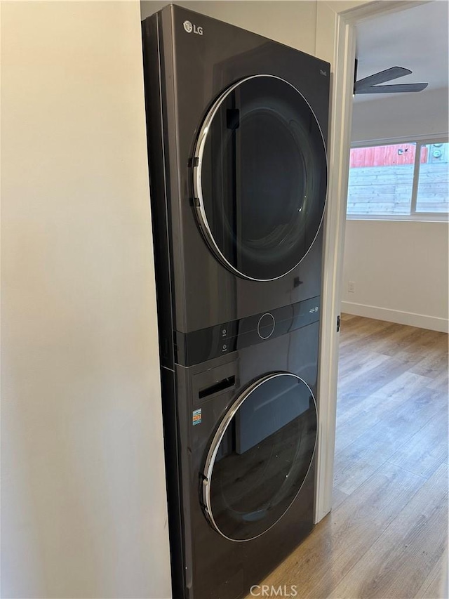 632 Truly Unit 634, Vista, CA 92084 - laundry area with estacked washer and dryer and wood finished floors