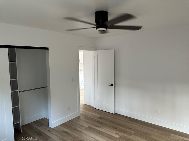 632 Truly Unit 634, Vista, CA 92084 - unfurnished bedroom featuring wood finished floors, a closet, and a ceiling fan