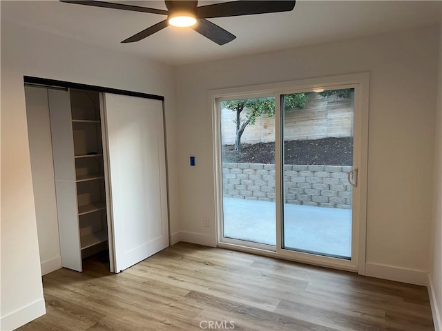 632 Truly Unit 634, Vista, CA 92084 - unfurnished bedroom featuring access to outside, light wood finished floors, a closet, and a ceiling fan