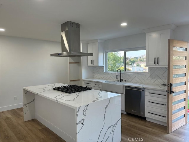 632 Truly Unit 634, Vista, CA 92084 - kitchen with dishwasher, island range hood, stovetop, tasteful backsplash, and wood finished floors