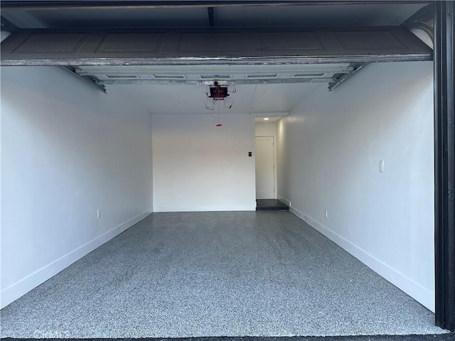 632 Truly Unit 634, Vista, CA 92084 - garage with a garage door opener and baseboards