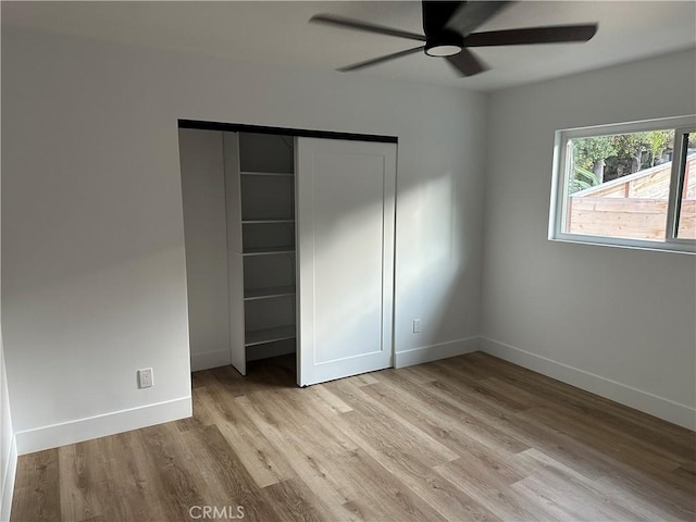 632 Truly Unit 634, Vista, CA 92084 - unfurnished bedroom featuring wood finished floors, a closet, and a ceiling fan