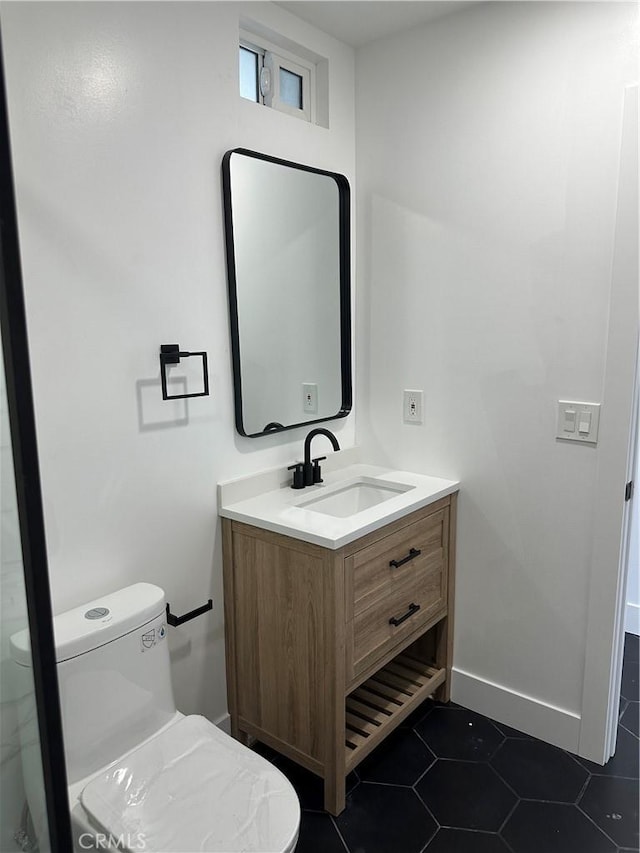 632 Truly Unit 634, Vista, CA 92084 - half bathroom featuring vanity and tile patterned floors