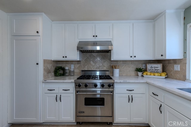 5035 Via Donaldo, Yorba Linda, CA 92886 - kitchen with luxury stove, extractor fan, white cabinets, decorative backsplash, and light stone countertops