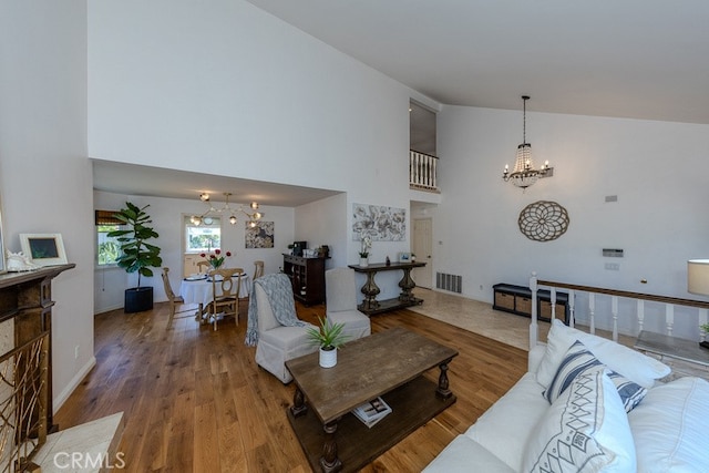 5035 Via Donaldo, Yorba Linda, CA 92886 - living area with a chandelier, high vaulted ceiling, and wood finished floors