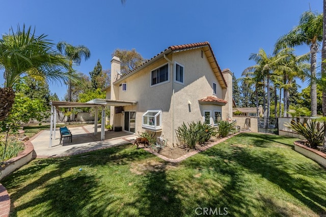 5035 Via Donaldo, Yorba Linda, CA 92886 - back of property featuring a chimney, a fenced backyard, a pergola, and a tiled roof