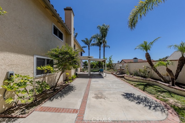 5035 Via Donaldo, Yorba Linda, CA 92886 - view of home's community featuring a patio, a pergola, and a fenced backyard