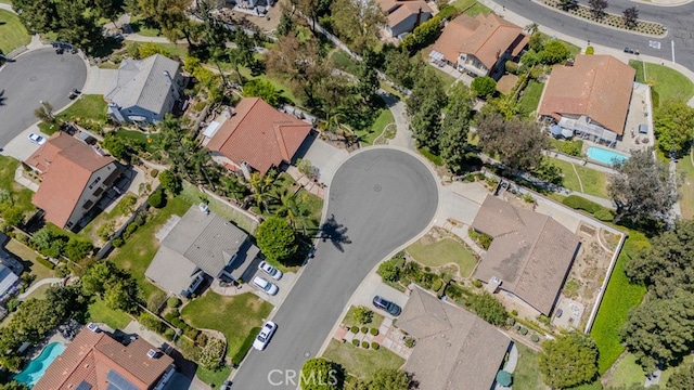 5035 Via Donaldo, Yorba Linda, CA 92886 - aerial view of property and surrounding area featuring nearby suburban area and a pool
