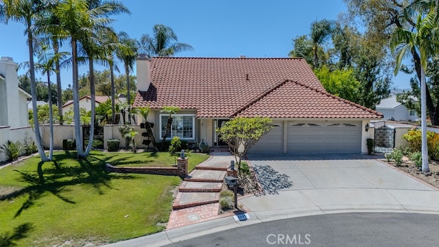 5035 Via Donaldo, Yorba Linda, CA 92886 - mediterranean / spanish house featuring a tiled roof, driveway, an attached garage, and stucco siding