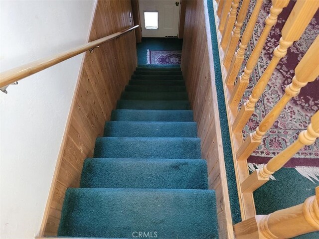 22726 Ponderosa Dr, Crestline, CA 92325 - staircase with wooden walls