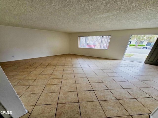 2573 Tiller Ave, Port Hueneme, CA 93041 - spare room featuring a textured ceiling and light tile patterned floors