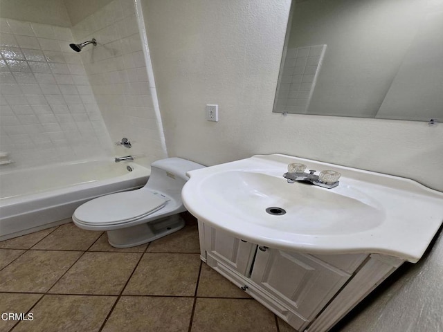 2573 Tiller Ave, Port Hueneme, CA 93041 - bathroom with tile patterned flooring, shower / bath combination, vanity, and a textured wall