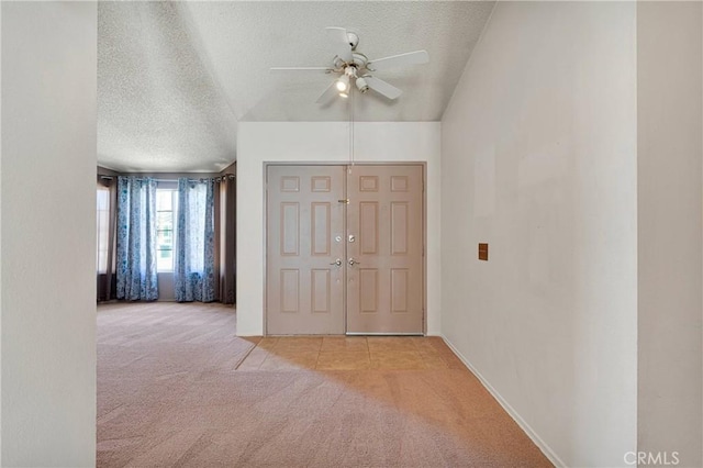 13491 Solitude Cir, Victorville, CA 92392 - carpeted entryway with a textured ceiling and a ceiling fan