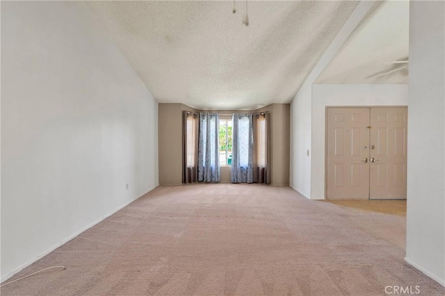 13491 Solitude Cir, Victorville, CA 92392 - carpeted empty room with a textured ceiling