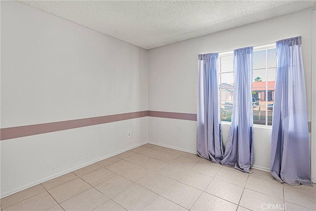 13491 Solitude Cir, Victorville, CA 92392 - empty room with a textured ceiling and baseboards