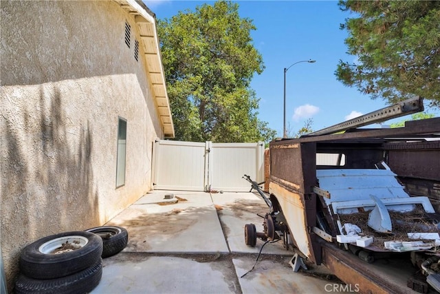 13491 Solitude Cir, Victorville, CA 92392 - view of patio / terrace featuring a gate
