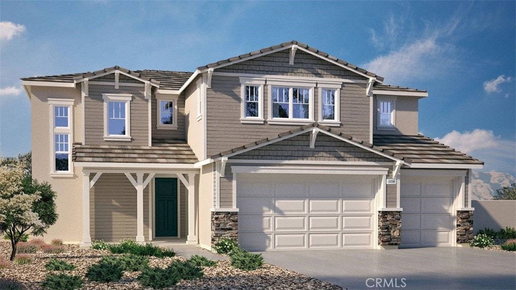 18382 Park Mountain Dr, Riverside, CA 92508 - craftsman inspired home featuring an attached garage, a tiled roof, concrete driveway, and stone siding